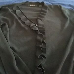 Cyrus Black ruffle trim shirt.